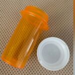 Woman sewed colorful beads onto old curtains. Just wait until you see them in the sunlight!